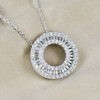 round brilliant and baguette cut diamond circle pendant pendant