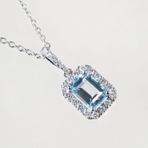 Blue Topaz and diamond cluster pendant