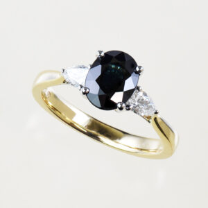 Blue Sapphire and diamond 3 stone ring