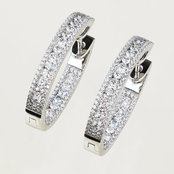 white gold and round cut diamond stud earrings