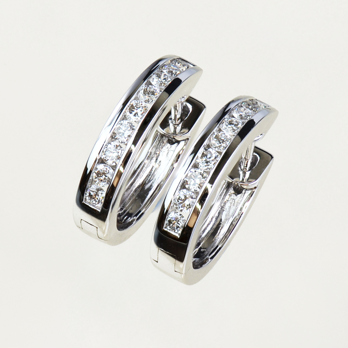 white gold and diamond channel set diamond hoops