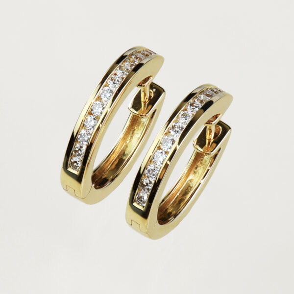 yellow gold and diamond channel set hoop earrings