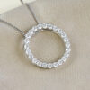 white gold and diamond circle pendant and chain