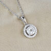 white gold and diamond cluster halo pendant