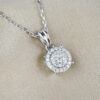 white gold and diamond halo style pendant and chain