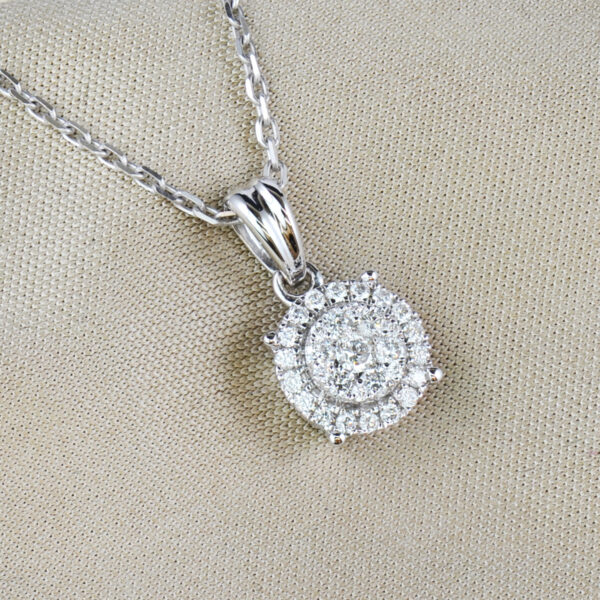 white gold and diamond halo style pendant and chain