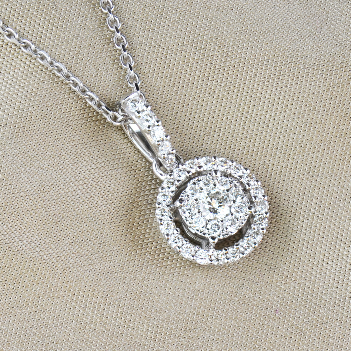 white gold and diamond halo cluster pendant