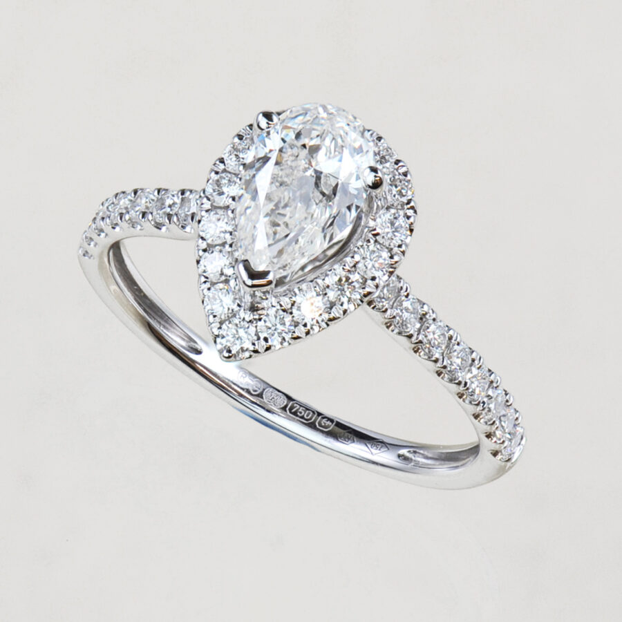 Pearshape diamond halo engagement ring