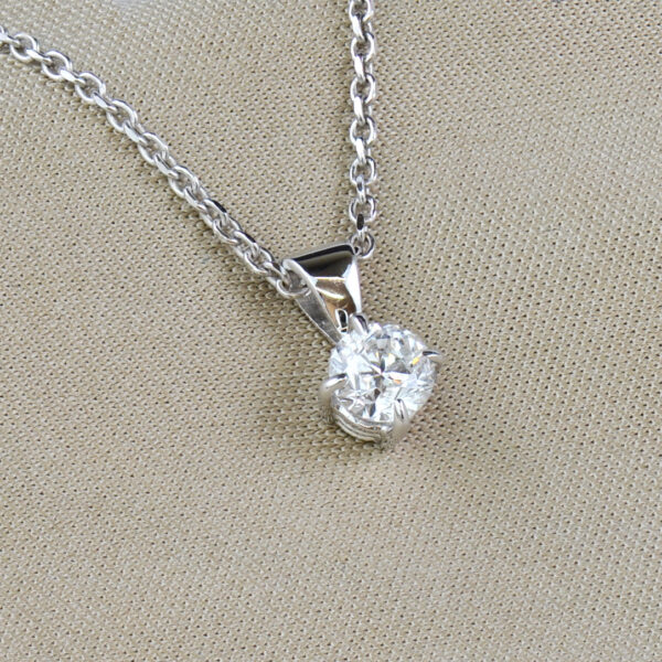 Round brilliant cut diamond solitaire necklace and chain