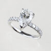 Natural pearshape diamond solitaire engagement ring