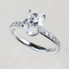 Natural oval diamond solitaire engagement ring
