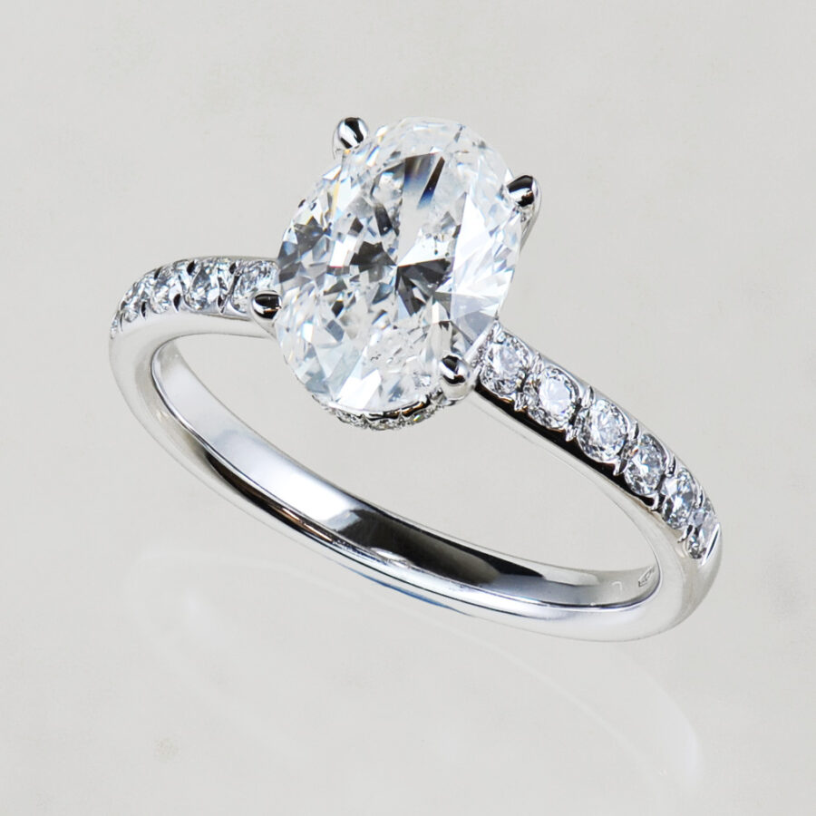 Natural oval diamond solitaire engagement ring