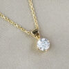 yellow gold and diamond solitaire pendant