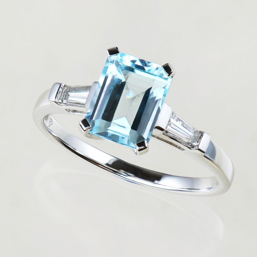 Blue Topaz and diamond 3 stone ring