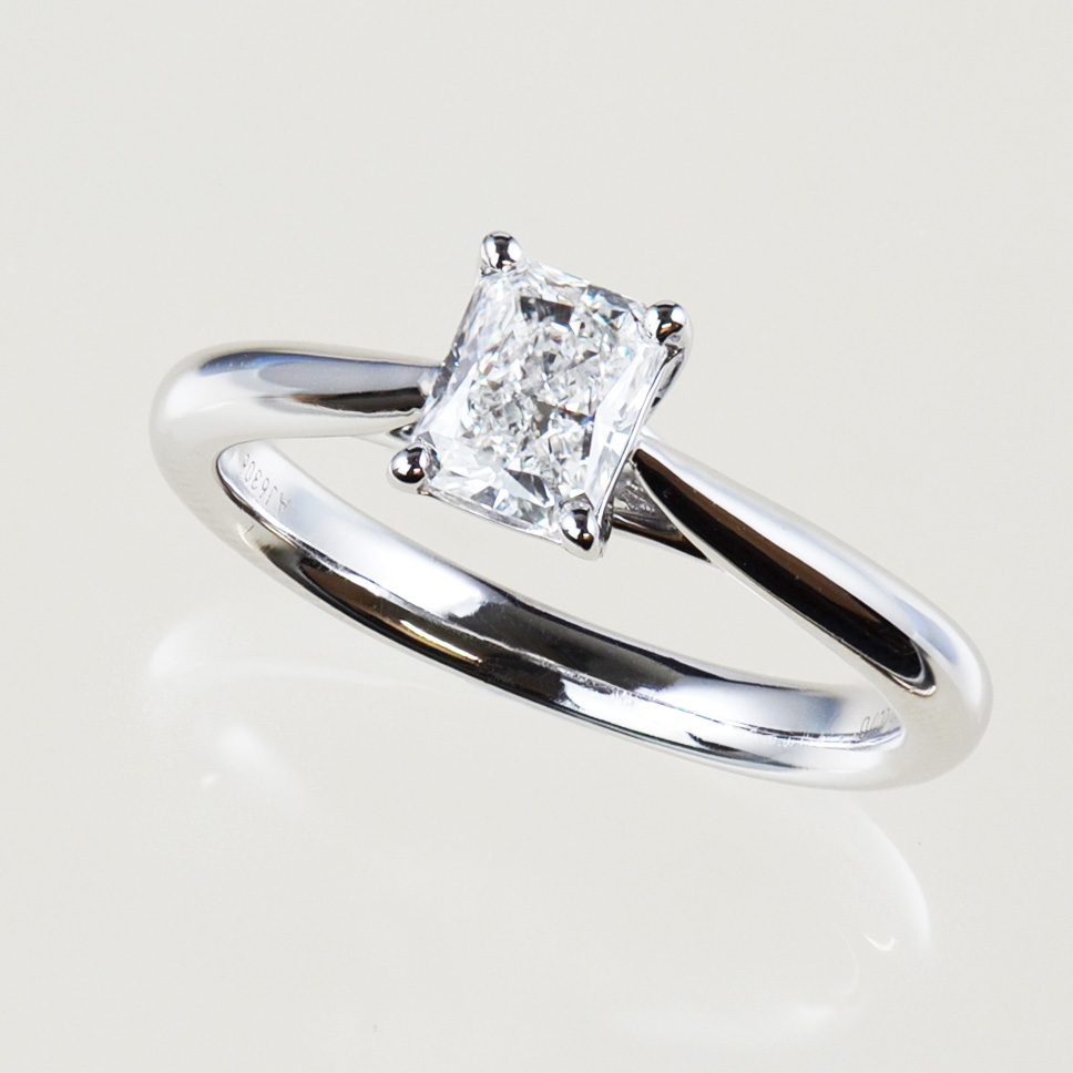 Radiant cut diamond solitaire engagement ring