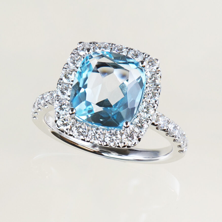 cushion cut blue topaz and natural round brilliant cut diamond cluster ring